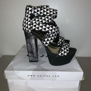 Black and white platform heels